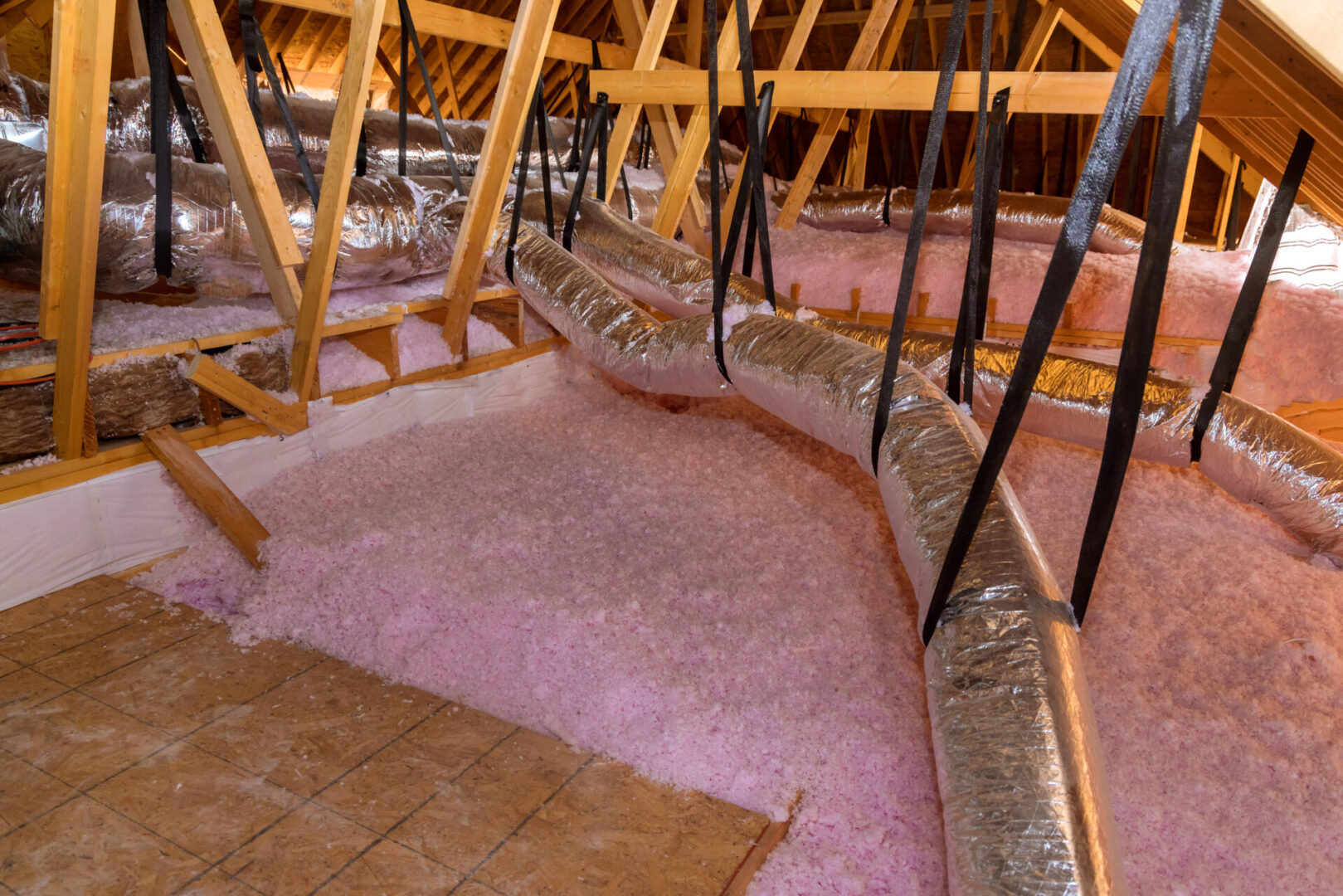Eco wool insulation is poured in the attic insulation roof for new home